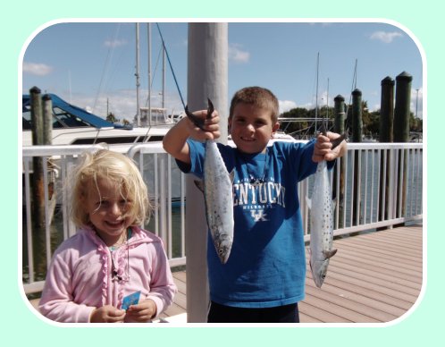 6 year old young angler with his first fish